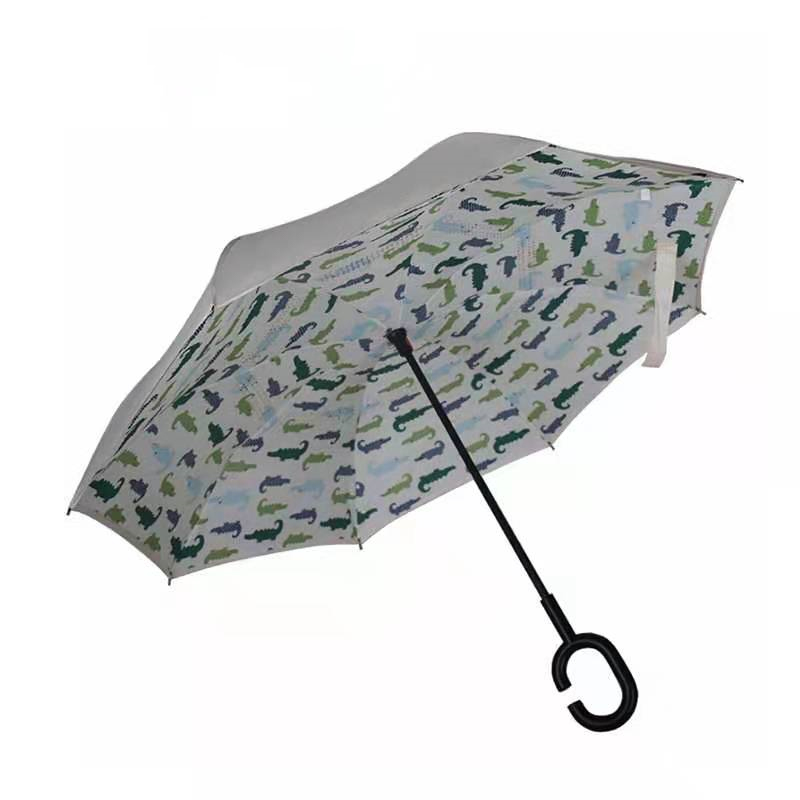 C обрабатывать водонепроницаемый инвертированный зонт